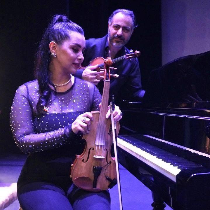 Ali and Yas in a piano studio